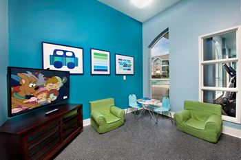Kids' activity room adjacent to fitness center